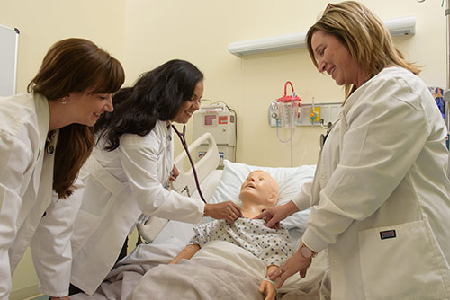 A nursing student smiling